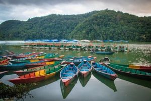 Colourful canoes on a lake